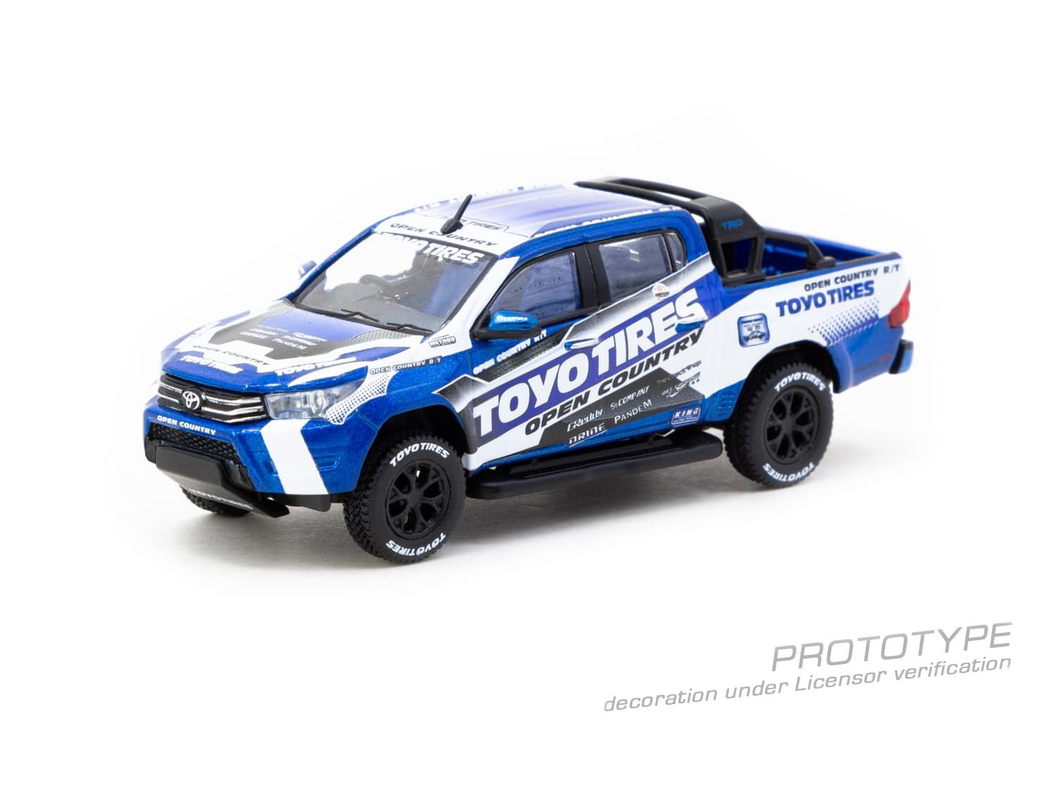 Tarmac Works 1:64 Toyota Hilux TOYO Tires – Blue with Graphics – Hobby64 PICKUP TOYOTA