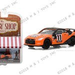 MODELO ESCALA 1:64 The Hobby Shop Series 3 – 2011 Nissan SKYLINE GT-R (R35) with Driver (orange)