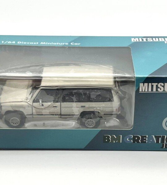 MODELO ESCALA 1:64 Mitsubishi 1st Gen Pajero 1983 – Ivory w/stripe - JAPAN