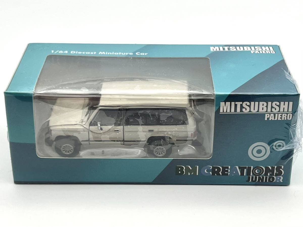 MODELO ESCALA 1:64 Mitsubishi 1st Gen Pajero 1983 – Ivory w/stripe - JAPAN