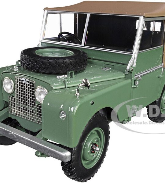 MODELO ESCALA 1/18 DE Land Rover 1949 Green with Brown Canopy 1/18 Diecast Model Car by Minichamps