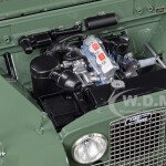 MODELO ESCALA 1/18 DE Land Rover 1949 Green with Brown Canopy 1/18 Diecast Model Car by Minichamps